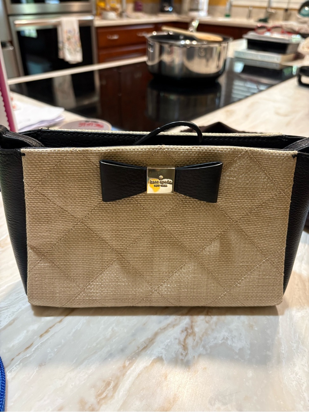 kate spade beige and black bow cosmetic pouch